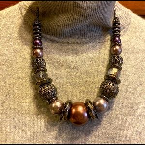 Statement necklace in tones of purple and silver